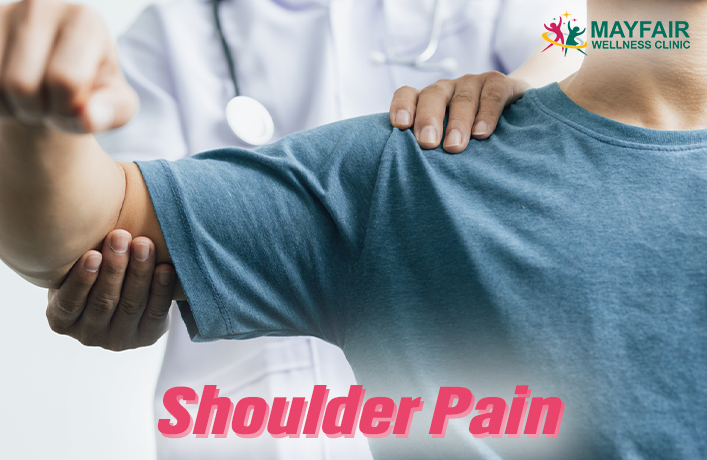 Physiotherapist treating patient’s shoulder for shoulder pain relief – Mayfair Wellness Clinic